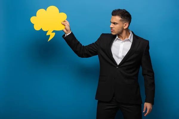 Side View Angry Businessman Looking Speech Bubble Blue Background — Stock Photo, Image