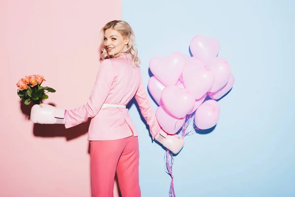 Smiling Woman Boxing Glove Holding Bouquet Balloons Pink Blue Background — Stock Photo, Image