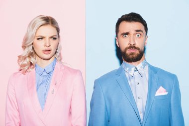 Pembe ve mavi arka planda sinirli bir kadın ve yakışıklı bir adam. 