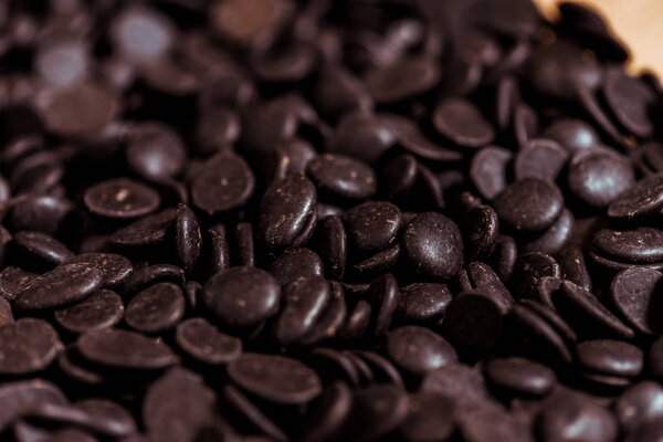 close up of dark and sweet chocolate chips 