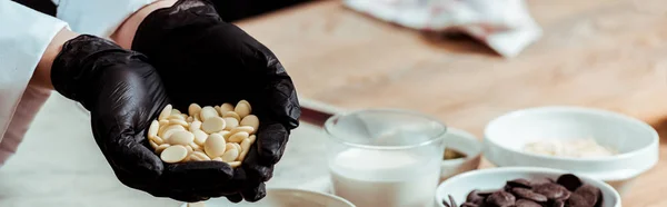 Panoramic Shot Woman Black Latex Gloves Holding White Chocolate Chips — Stock Photo, Image