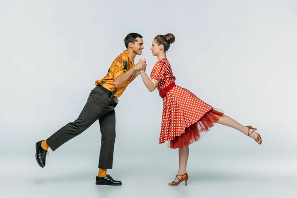 Bailarines Elegantes Tomados Mano Mientras Bailan Boogie Woogie Sobre Fondo — Foto de Stock