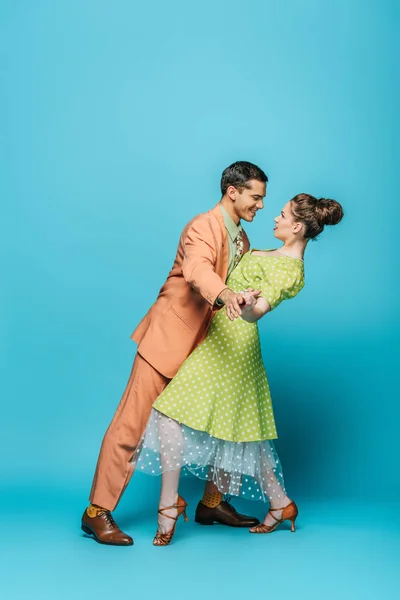 Side View Stylish Dancers Dancing Boogie Woogie Blue Background — 스톡 사진