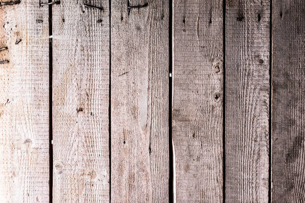 weathered wooden natural textured grey surface with nails