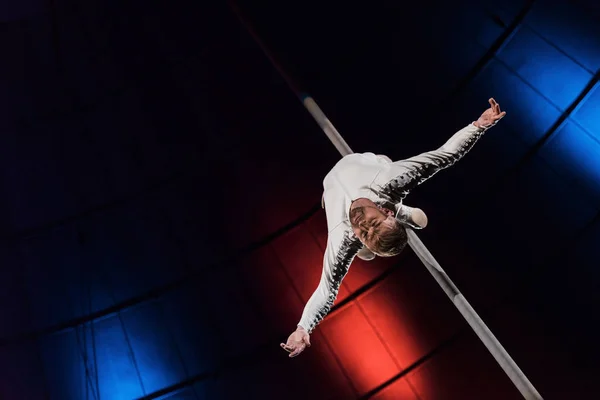 Low Angle View Strong Acrobat Outstretched Hands Performing Metallic Pole — 스톡 사진