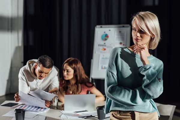 Selective Focus Attractive Art Director Looking Away While Standing Coworkers — Stock Photo, Image