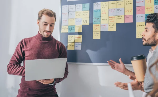 Mixed Race Man Talking Scrum Master Using Laptop — Stock Photo, Image