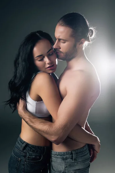 Sensual Young Couple Hugging Grey Back Light — Stock Photo, Image