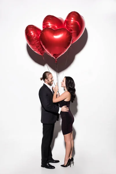 Beautiful Happy Couple Holding Red Heart Shaped Balloons Valentines Day — 스톡 사진