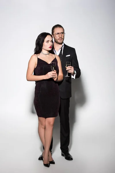 Beautiful Couple Suit Dress Holding Champagne Glasses Valentines Day White — 스톡 사진