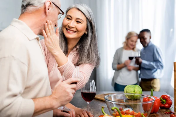 Selective Focus Smiling Multicultural Friends Talking Holding Wine Glasses — Stockfoto