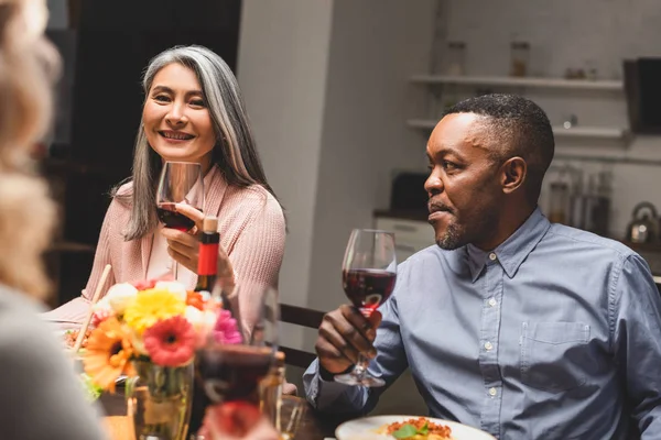 Selective Focus Smiling Asian Woman African American Man Holding Wine — Stock Photo, Image