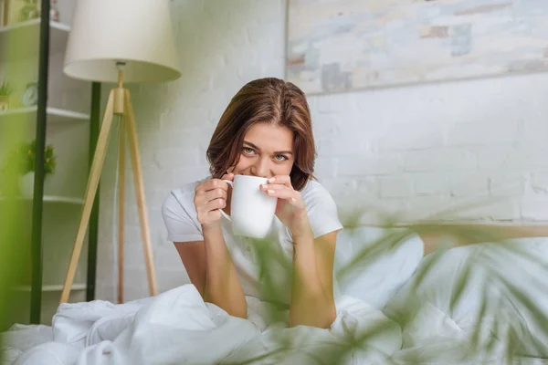 Selective Focus Young Woman Looking Camera While Holding Cup Tea — 스톡 사진