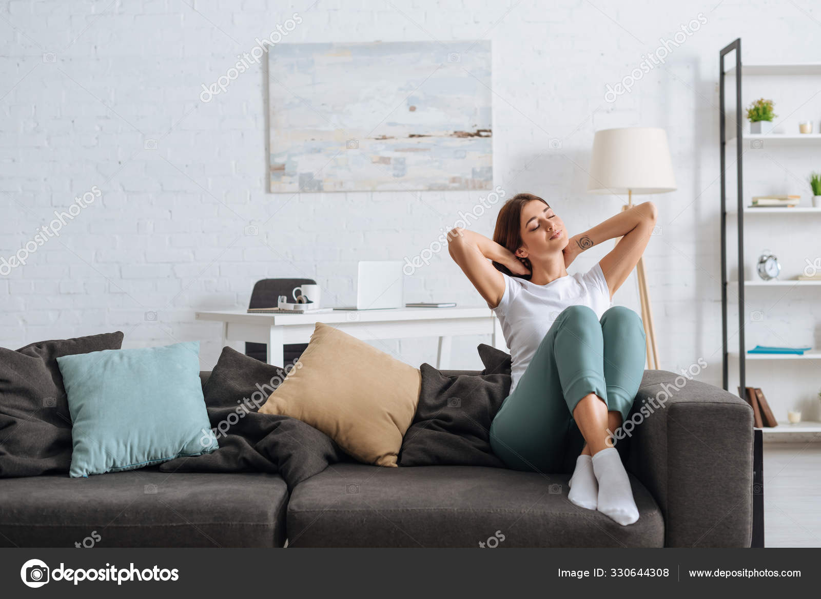 Happy Young Woman Sitting Sofa Living Room Stock Photo by ©HayDmitriy ...