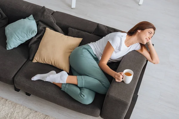 Overhead View Attractive Woman Chilling Sofa Cup Tea — 스톡 사진