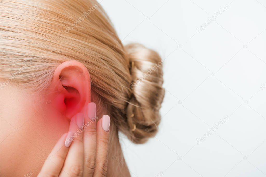 cropped view of blonde woman touching inflamed ear isolated on white 
