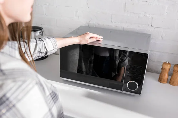 Cropped View Woman Looking Microwave Kitchen — Stockfoto