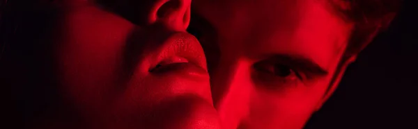 Close View Passionate Young Couple Kissing Red Light Panoramic Shot — Stock Photo, Image