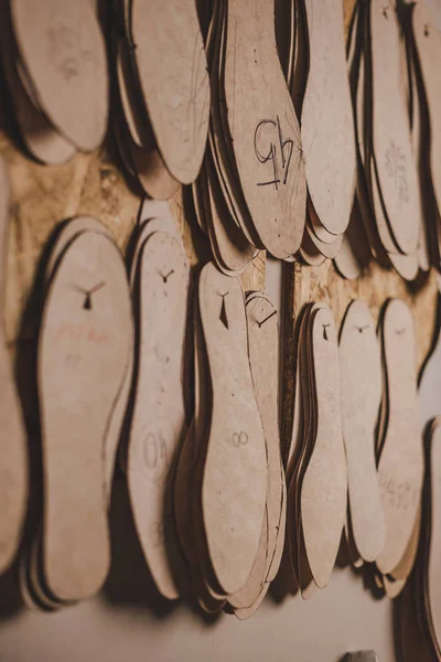 Selective Focus Footwear Insoles Different Sizes Hanging Wall Workshop — Stock Photo, Image