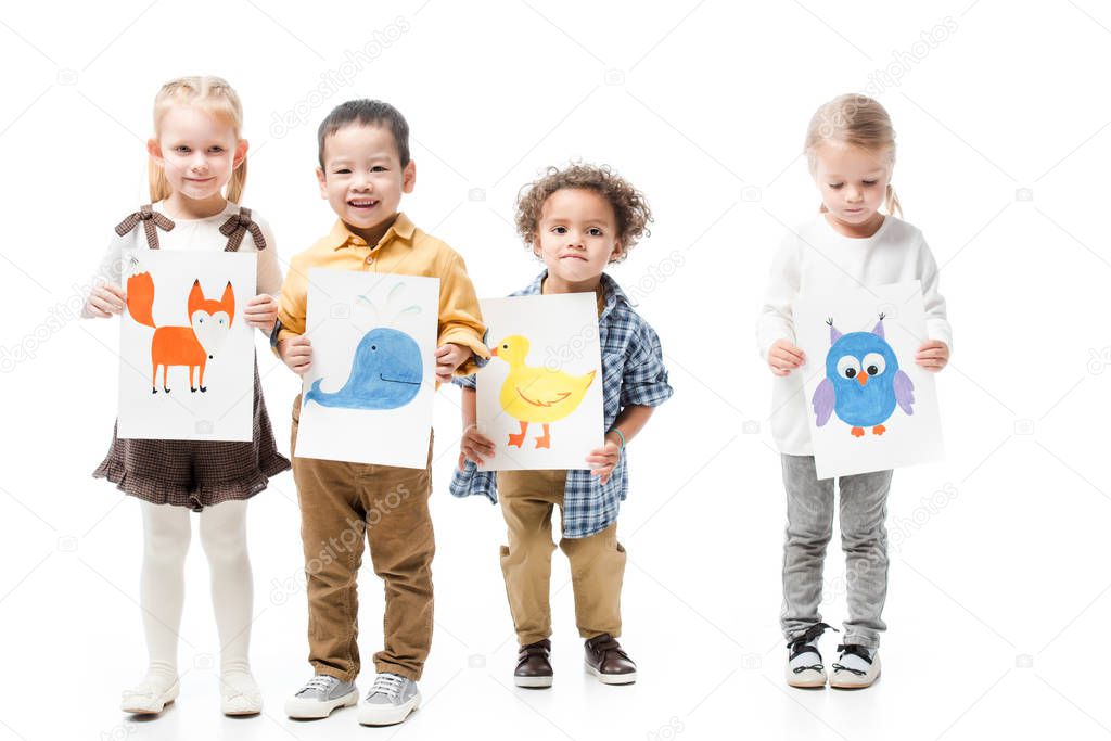 multicultural children holding paintings, isolated on white