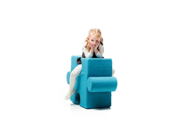 Bored Kid Sitting Blue Puzzle Chair Isolated White — 스톡 사진