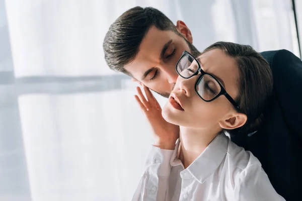 Businessman Kissing Attractive Secretary Closed Eyes Office — ストック写真