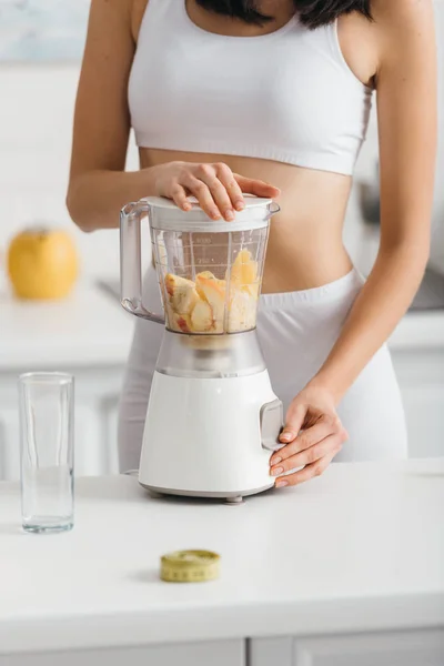 Cropped View Fit Sportswoman Preparing Smoothie Fresh Fruits Measuring Tape — Stock Photo, Image