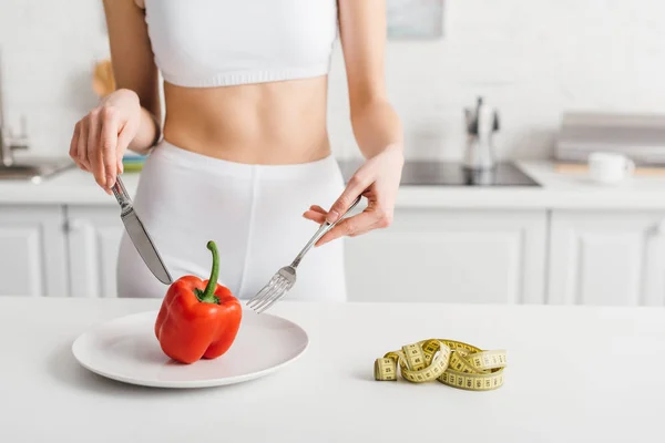 Cropped View Sportswoman Cutlery Bell Pepper Measuring Tape Table — Stock Photo, Image