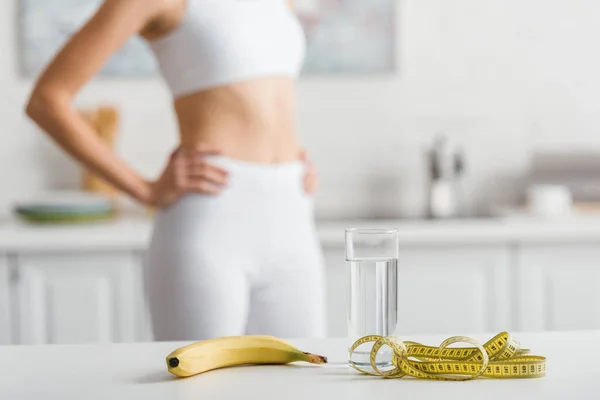 Selective Focus Banana Glass Water Measuring Tape Table Sportswoman Kitchen — 스톡 사진