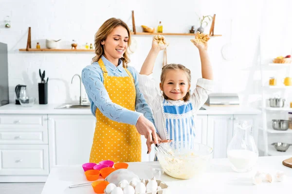 Smiling Mother Daughter Aprons Mixing Dough Kitchen — 스톡 사진