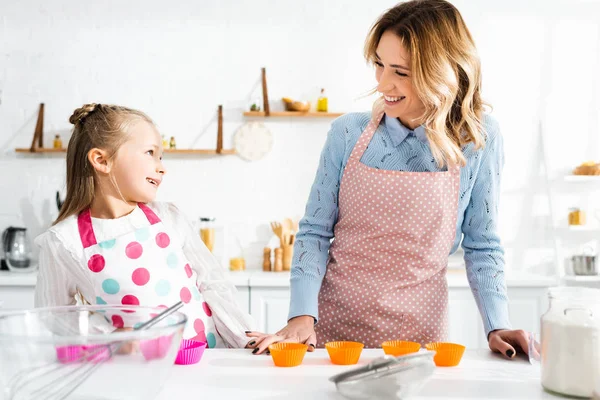 Smiling Mother Daughter Aprons Looking Each Other — Stock Photo, Image