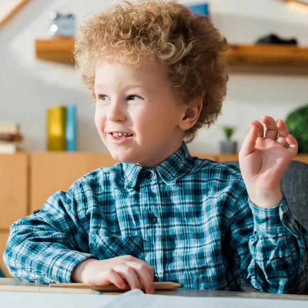 Happy Kid Smiling While Looking Away — Stock Photo, Image