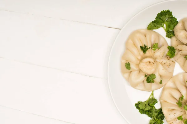 Top View Delicious Khinkali Cilantro Plate White Wooden Table — Stock Photo, Image