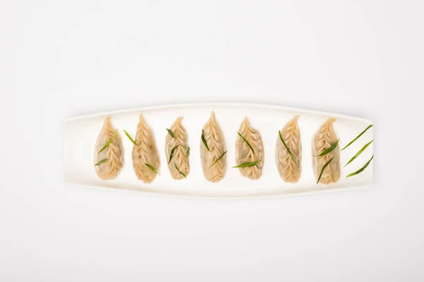 stock image top view of delicious Chinese boiled dumplings on plate on white background