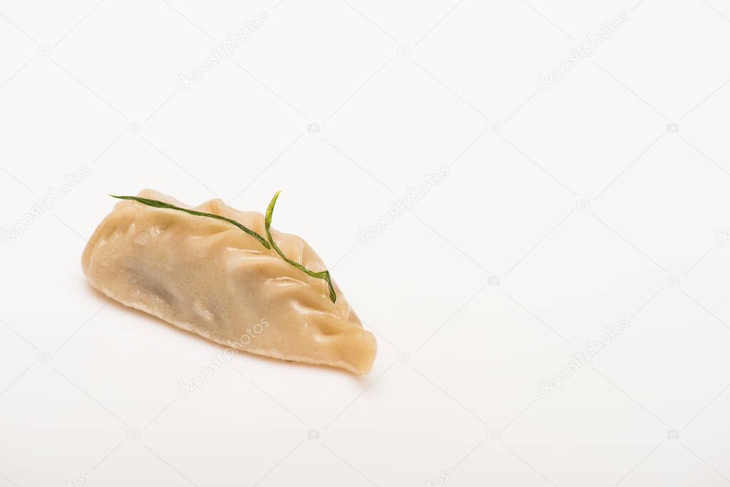 close up view of delicious Chinese boiled dumpling on white background