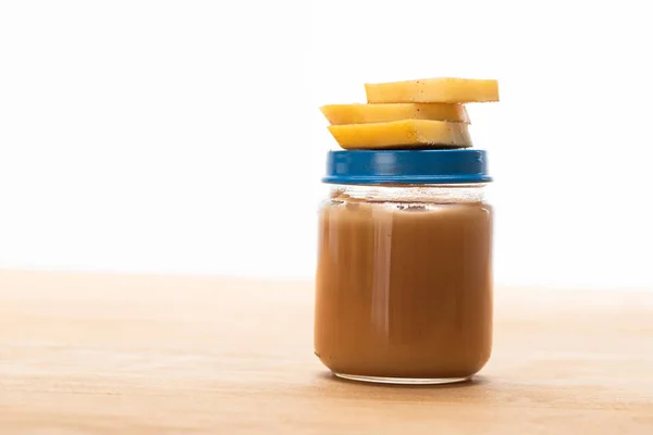 Banana Slices Jar Fruit Baby Nutrition Wooden Surface Isolated White — Stock Photo, Image