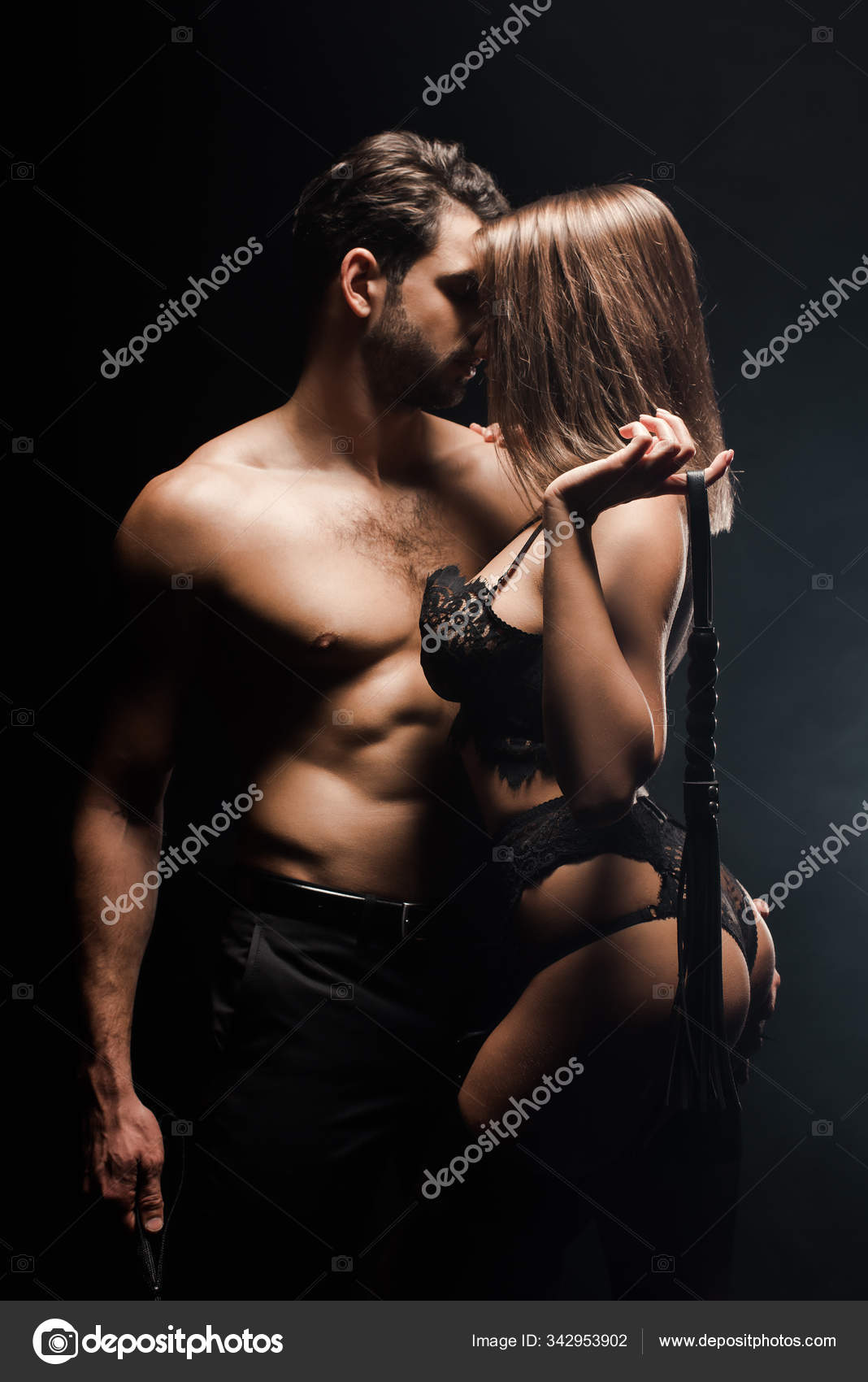 Side View Dominant Woman Holding Flogging Whip Shirtless Submissive Man Stock Photo by ©HayDmitriy 342953902