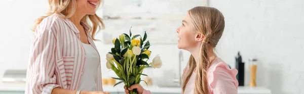 Panoramic Shot Happy Kid Giving Flowers Cheerful Mother Home — Stockfoto