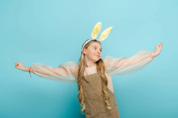 Cheerful Kid Bunny Ears Outstretched Hands Isolated Blue — Stock Photo, Image