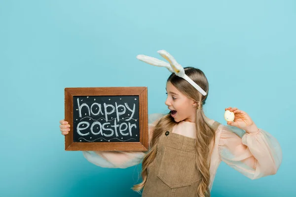 Excited Kid Bunny Ears Holding Chalkboard Happy Easter Lettering Painted — 스톡 사진