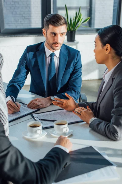 Multicultural Business Partners Discussing Contract Meeting Translator Office Cups Coffee — Stock Photo, Image