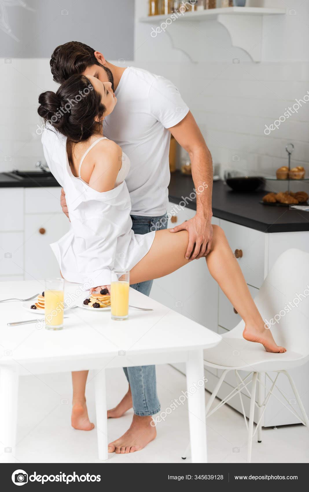 Sexy legs cooking in the kitchen