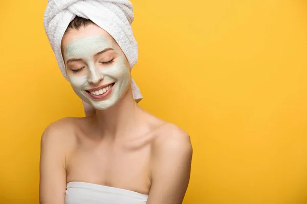 Smiling Girl Nourishing Facial Mask Standing Closed Eyes Isolated Yellow — Stock Photo, Image