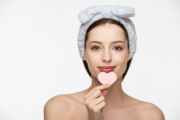 Smiling Girl Holding Heart Shaped Cosmetic Sponge While Looking Camera — Stock Photo, Image