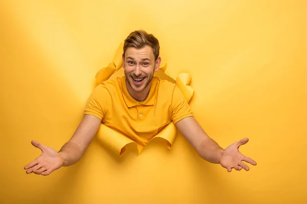 Happy Handsome Man Yellow Outfit Yellow Paper Hole Open Arms — Stock Photo, Image