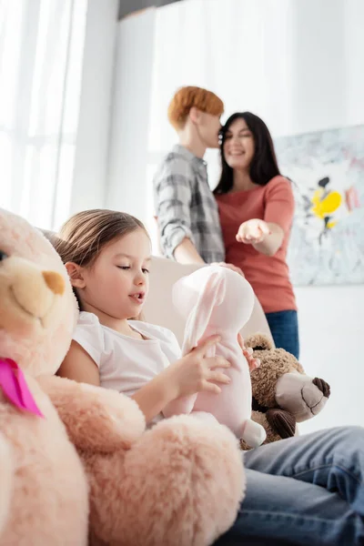 Selective Focus Kid Playing Soft Toy Smiling Mothers Living Room — Stock Photo, Image