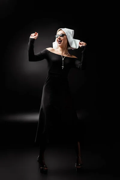 Excited Sexy Nun Dancing Black Dress Sunglasses Black — Stock Photo, Image