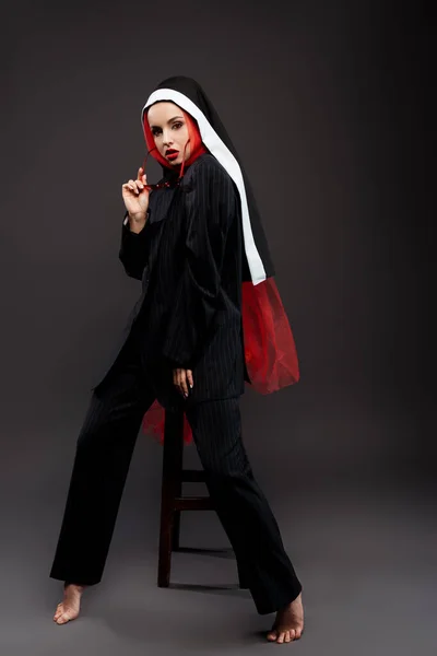 Barefoot Fashionable Sexy Nun Posing Black Suit Red Scarf Sunglasses — Stock Photo, Image