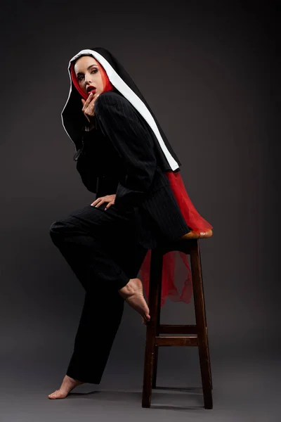 Barefoot Fashionable Sexy Nun Posing Black Suit Red Scarf Grey — Stock Photo, Image