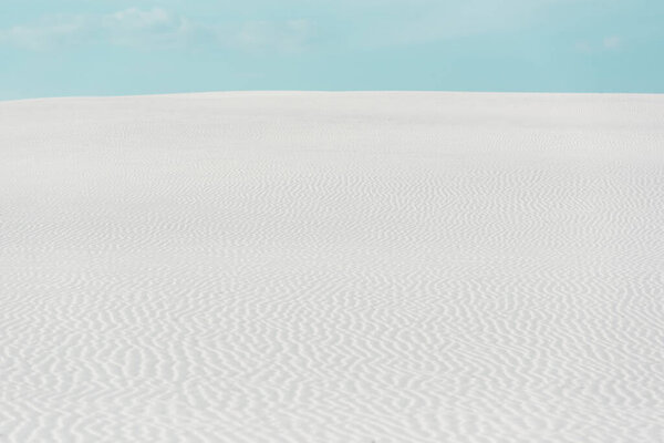 beautiful beach with white textured sand and blue sky